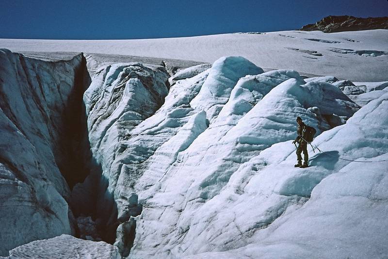 August 5, 1997 - From Finse to the Hardangerjkulen (glacier) and back, Norway.<br />Torger at the edge of a big crevasse (posing for the photo).