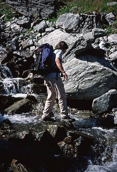 August 5, 1997 - Finse to Flm via Myrdal, Norway.<br />Joyce negociating a small side stream.