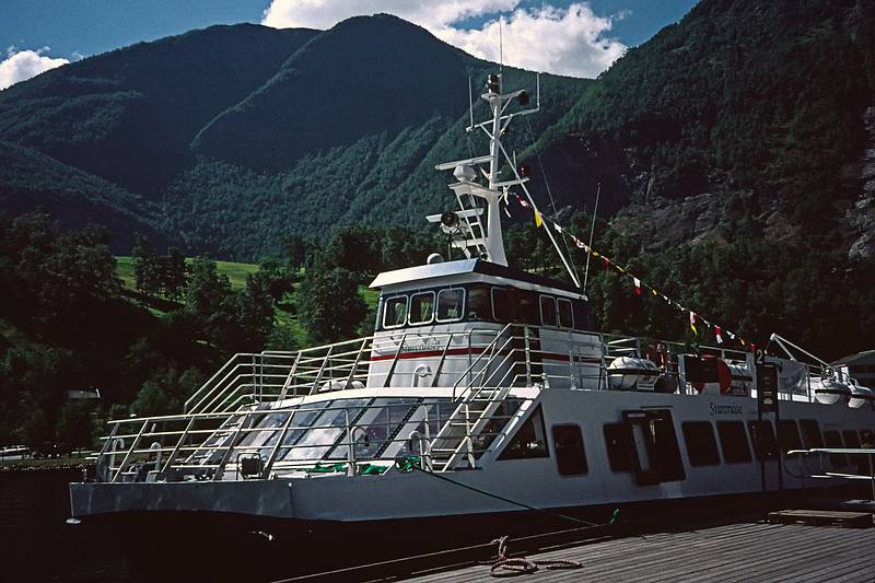 August 6, 1997 - In and around Flm. Norway.<br />A fjords tour to Gudvangen and back.<br />Ferry boat at the dock in Flm.