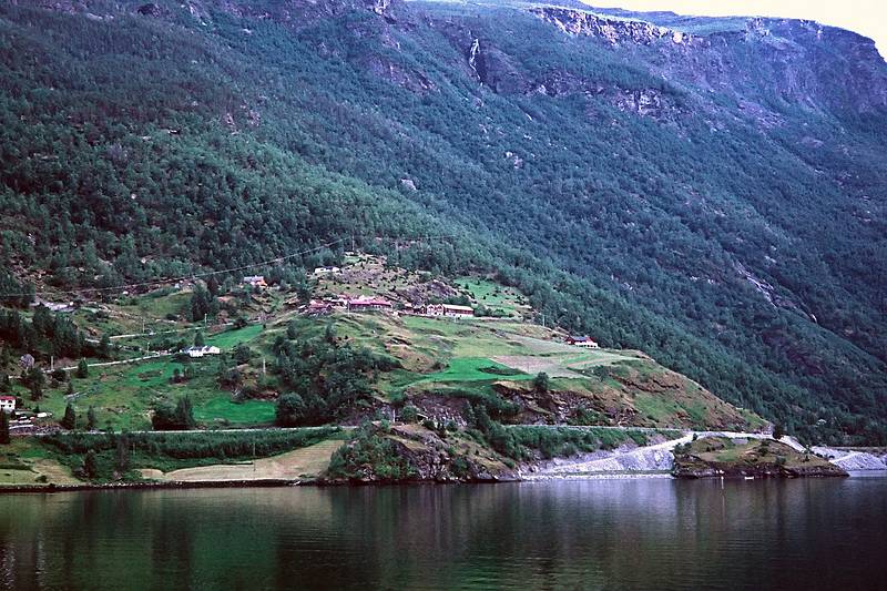 August 6, 1997 - In and around Flam, Norway.<br />A fjords tour to Gudvangen and back.<br />The Viking farm as seen from the fjord.