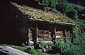 August 7, 1997 - Aurlandsdalen (Aurland valley) hike, Norway.<br />Old farm building built under an overhang of the mountainside.