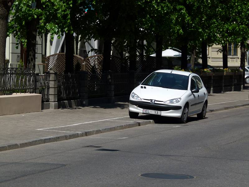 Parking halfway on sidewalk, per markings.<br />June 2, 2011 - Riga, Latvia.