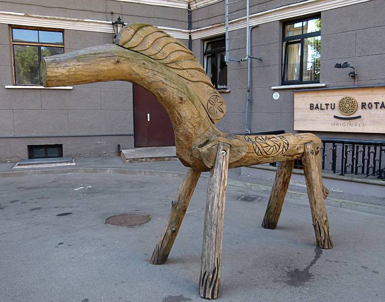 On St. Peter's Church Square in front of Baltu Rotas (Jewelry) store and museum.<br />June 3, 2011 - Riga, Latvia.