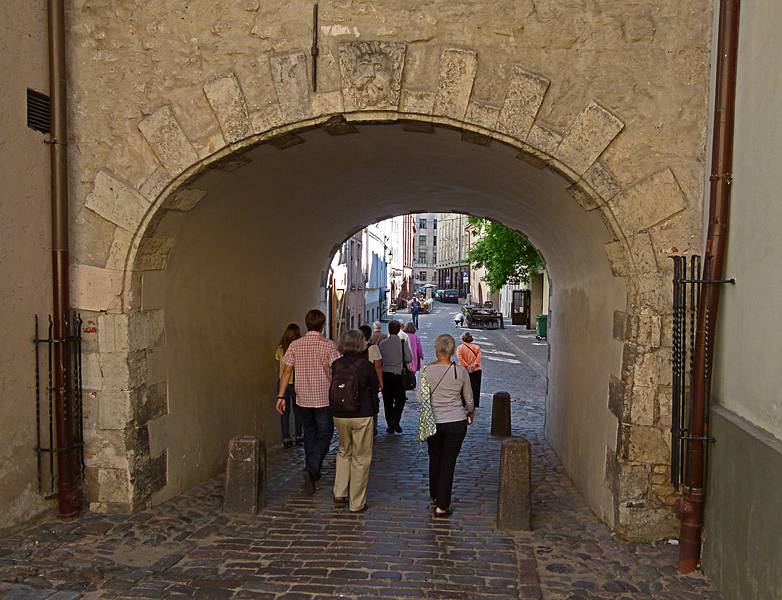 Our group (and other) walking under the Swedish Gate.<br />June 3, 2011 - Riga, Latvia.