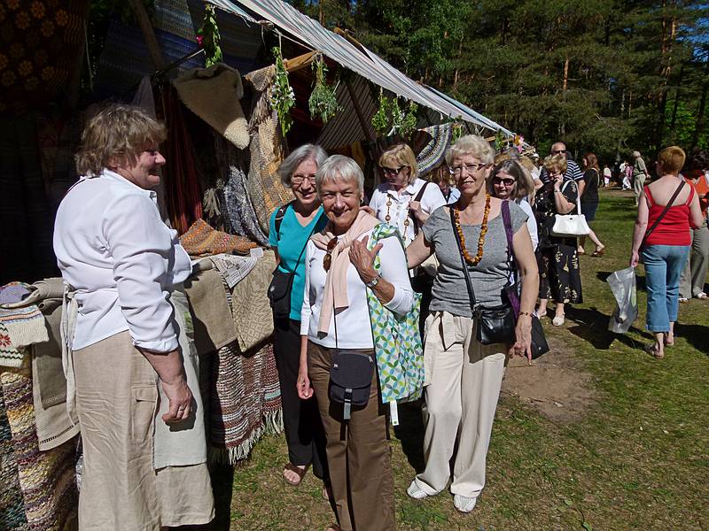 Joyce, Baiba, and Daina (is that Betsy behind Daina's left shoulder?).<br />Arts and crafts fair at the Latvian Ethnographic Open Air Museum.<br />June 4, 2011 - Riga, Latvia.