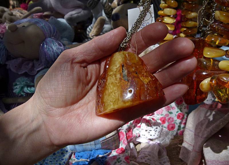 A monster amber piece.<br />Arts and crafts fair at the Latvian Ethnographic Open Air Museum.<br />June 4, 2011 - Riga, Latvia.