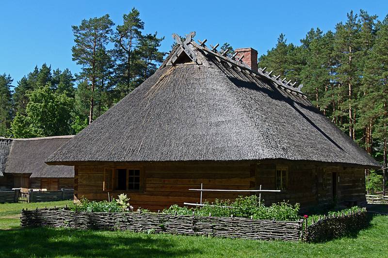 Building with thatched roof.<br />Latvian Ethnographic Open Air Museum.<br />June 4, 2011 - Riga, Latvia.