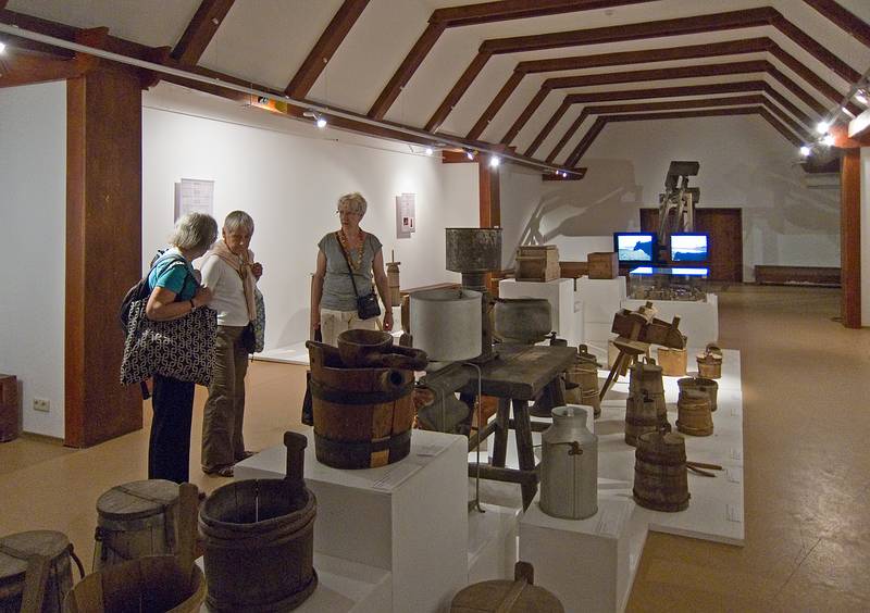 Joyce, Baiba, and Daina in the dairy building.<br />Latvian Ethnographic Open Air Museum.<br />June 4, 2011 - Riga, Latvia.