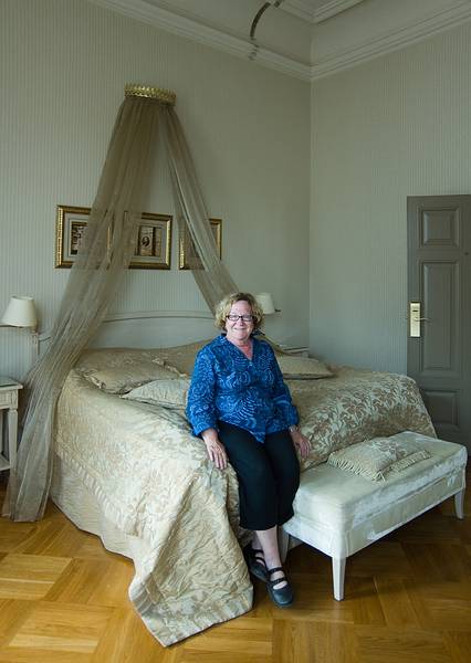 Carolyn in her bedroom at the Europa Royale Riga Hotel.<br />June 11, 2010 - Riga, Latvia.