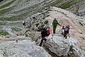 Melody, Joyce, and Sati negotiating the ridge.<br />Hike from Seceda cable car terminal to Puez hut.<br />July 26, 2011 - NE of St. Ulrich/Ortisei, Italy.