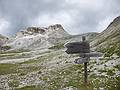 Sign pointing right to our destination.<br />The lower sign points to tomorrow's trail down for Joyce and I.<br />Hike from Seceda cable car terminal to Puez hut.<br />July 26, 2011 - NE of St. Ulrich/Ortisei, Italy.