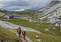 Sati, Melody, and Joyce.<br />Finally, our goal is in sight.<br />Hike from Seceda cable car terminal to Puez hut.<br />July 26, 2011 - NE of St. Ulrich/Ortisei, Italy.