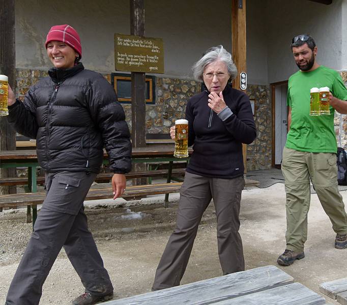 Melody, Joyce, and Sati bringing a well deserved tread.<br />Hike from Seceda cable car terminal to Puez hut.<br />July 26, 2011 - NE of St. Ulrich/Ortisei, Italy.