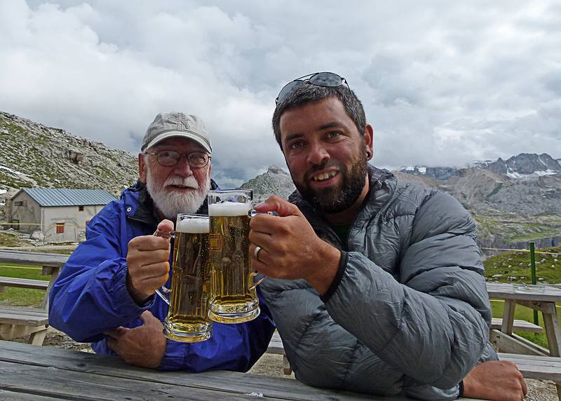 Egils and Sati celebrating making it to the Puez Hut.<br />Hike from Seceda cable car terminal to Puez hut.<br />July 26, 2011 - NE of St. Ulrich/Ortisei, Italy.