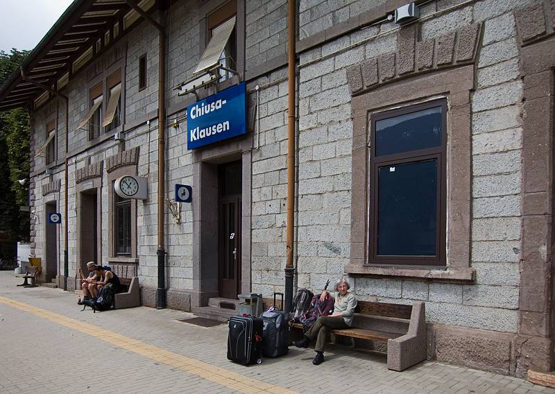 Joyce waiting for the train to Franzenfeste, our second leg on the way to Cortina.<br />July 28, 2011 - Klausen, South Tyrol, Italy.