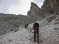 Melody, Sati, and Joyce now on trail #216 climbing up to Marcuoira notch.<br />Hike from cable car terminal at Rifugio Faloria to Rifugio Vandelli near Lake Sorapiss.<br />July 29, 2011 - East of Cortina d' Ampezzo, Italy.