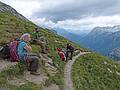 Joyce Sati and Melody taking a deserved break after reaching Marcuoira notch.<br />Hike from cable car terminal at Rifugio Faloria to Rifugio Vandelli near Lake Sorapiss.<br />July 29, 2011 - East of Cortina d' Ampezzo, Italy.