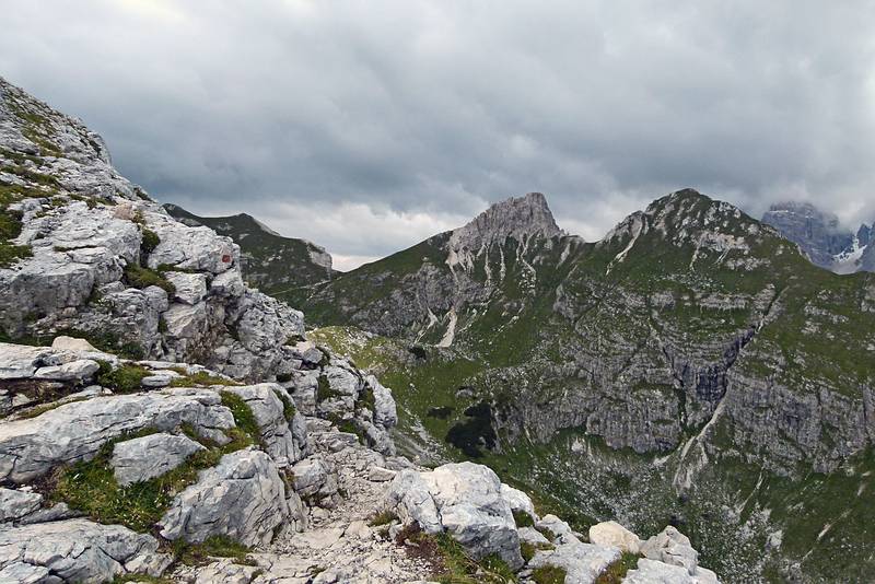 Looking back from where we came (the lowest notch on the horizon).<br />Hike from cable car terminal at Rifugio Faloria to Rifugio Vandelli near Lake Sorapiss.<br />July 29, 2011 - East of Cortina d' Ampezzo, Italy.