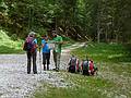 Joyce, Melody and Sati looking at how to get Joyce and me back to Cortina.<br />July 30, 2011 - Hike from Vandelli hut down to the valley via trail #217 (E of Cortina, Italy).