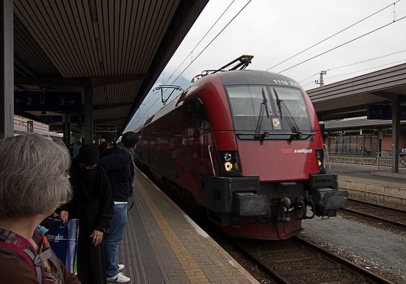 Joyce watches the arrival of our train to Feldkirch.<br />August 1, 2011 - Innsbruck, Austria.