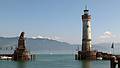 The Bavarian Lion and the new lighthouse at the entrance to the harbor.<br />August 2, 2011 - Lindau, Bavaria, Germany.