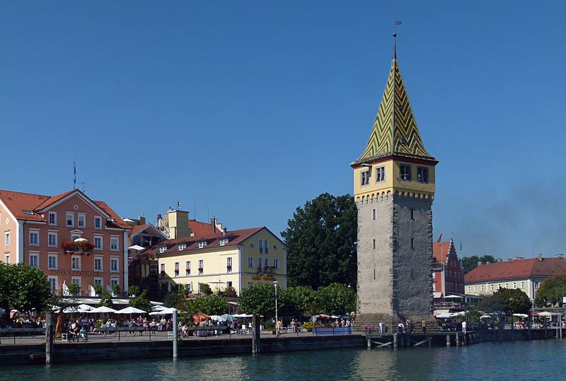 The old lighthuse with its colorful tiled roof.<br />August 2, 2011 - Lindau, Bavaria, Germany.